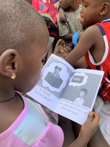 415698162_393542159754935_5733707038622767235_n child-reading-uganda